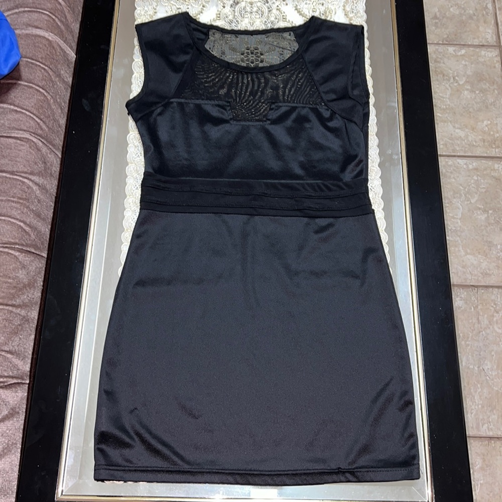 Black mini dress with mesh cutout pattern
